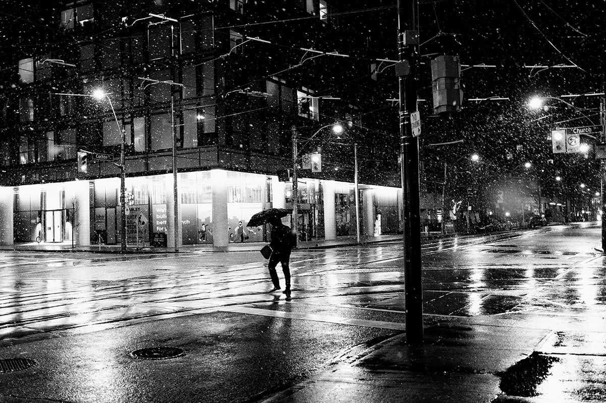 church carlton man in storm umbrella2 acros bright web 1